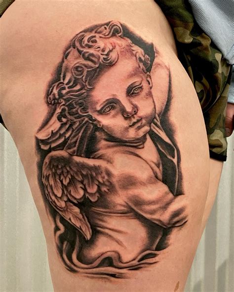 cherub angel tattoo|realistic cherub tattoo.